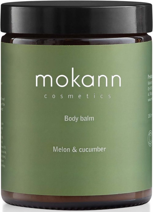 En grön burk med svart lock märkt 'mokann' och 'Body balm Melon & cucumber'.