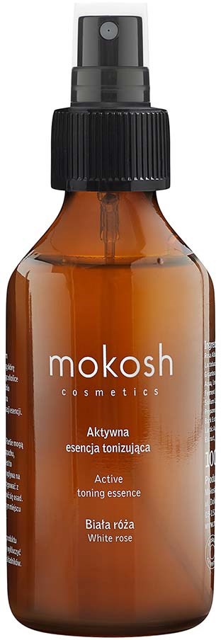 A brown spray bottle with a black cap and label, labeled 'mokosh cosmetics' and 'white rose'.