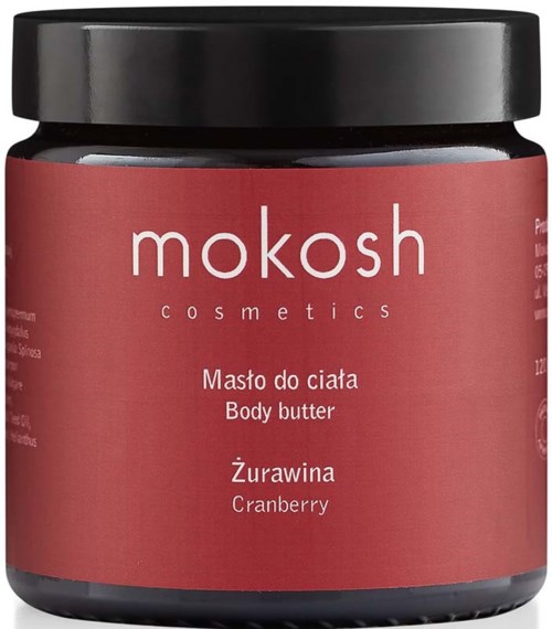 A jar of boddy butter with cranberry flavored, pink label and black lid from Mokosh Cosmetics.