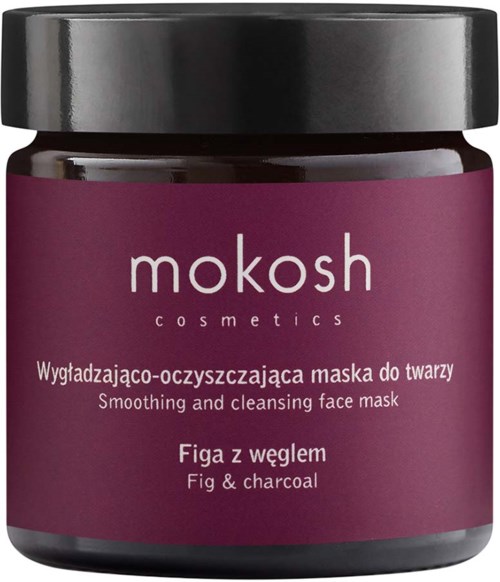 A jar of face mask labeled 'mokosh cosmetics' with a purple label, black lid, and text about face mask with fig and charcoal.
