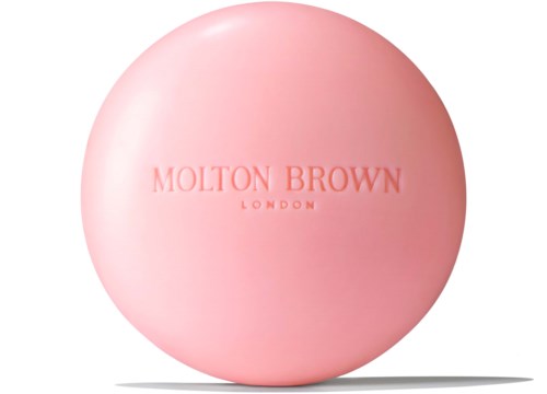 En rosa rund gjenstand med teksten 'MOLTON BROWN LONDON'.
