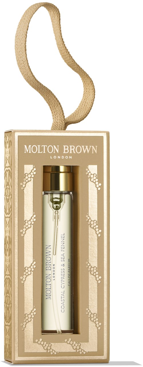 En parfyllflaska med guldlock i en dekorativ beige box, hängande av en beige remsa, märkt 'Molton Brown.'