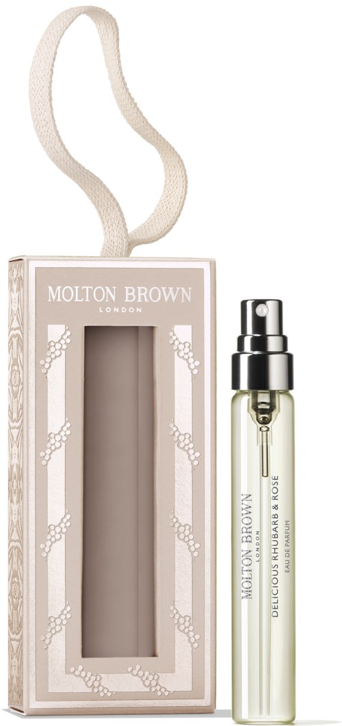 En parfymesprayflaske med emballage og en rem, mærket Molton Brown London.