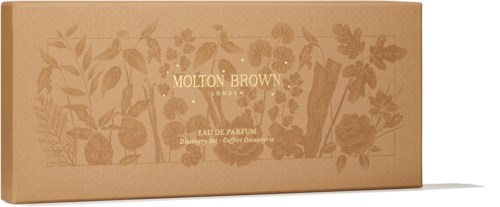 En beige æske med blomsterdesign og guldtekst til Molton Brown parfume.