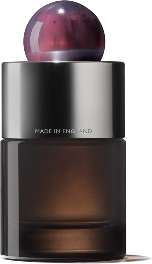 En flaska med en rosa sfärisk topp, silvermitten och mörkbrun botten, märkt "Made in England."