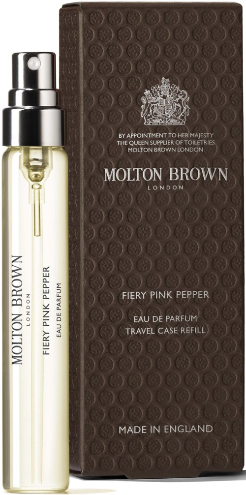 En liten parfymflaska och en brun box. Boxen har text om en rosapepparparfym från Molton Brown.