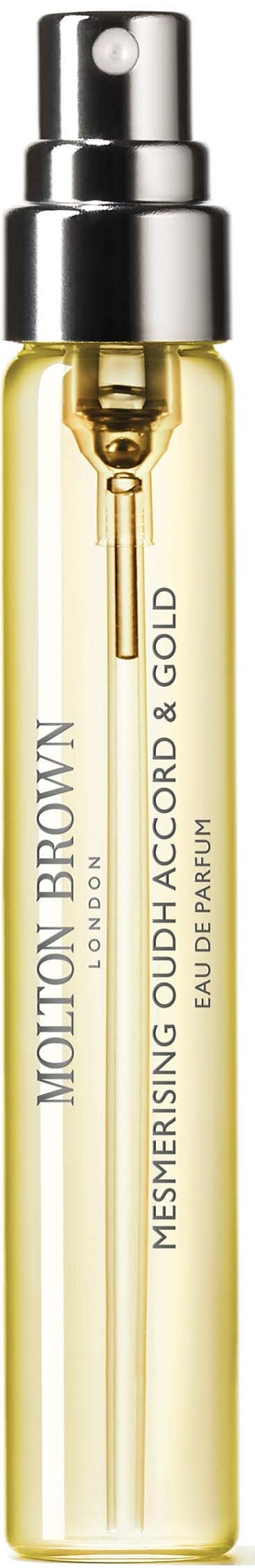 Kleine Glasflasche mit Sprühverschluss, beschriftet 'Molton Brown' und 'Mesmerising Oud香 & Gold'.