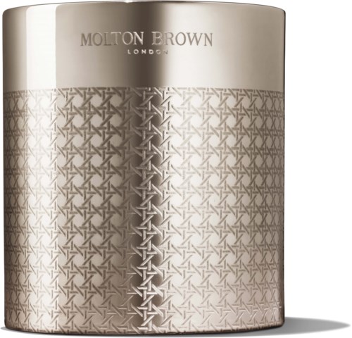 Een zilverkleurige container met de merknaam Mollton Brown en een patroon op het oppervlak.