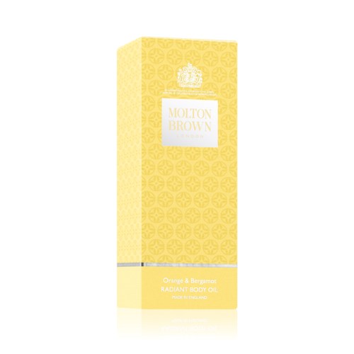Gul boks med hvit etikett, tekst sier Molton Brown, orange og bergamot kroppsolje.