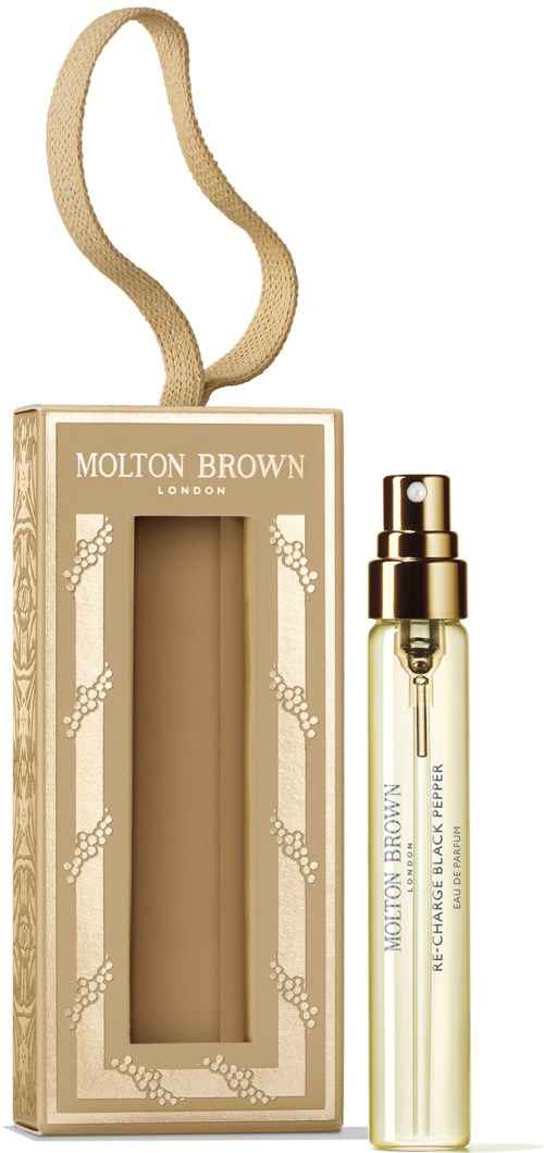Molton Brown Parfüm mit Sprühflasche und beige Schmuckschachtel mit Band.