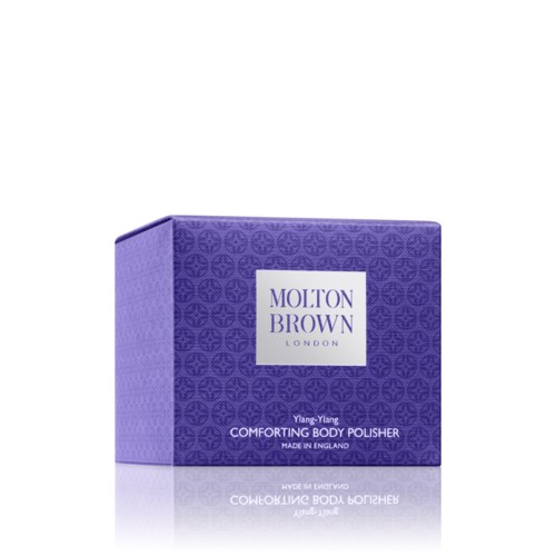 Lila box med Molton Brown lugnande kroppspolish från London, med ett mönstrat design på boxen.