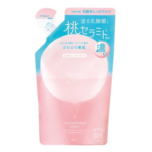En rosa och blå påse med lotion och japansk text, tyder på ett persikoflavorerat hudvårdsprodukt.