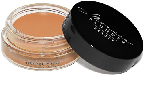 A small jar of skin-colored foundation with a black lid labeled "Morphe Beauty".