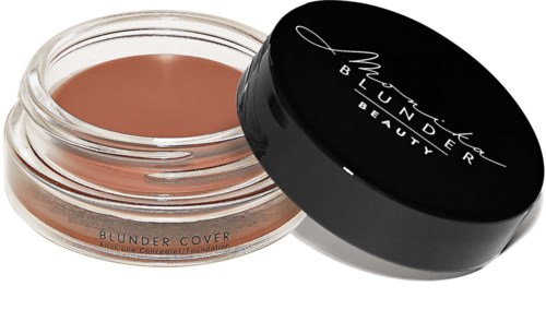 A small jar of foundation with a black lid and white text, labeled 'Blunder Cover' by NARS.
