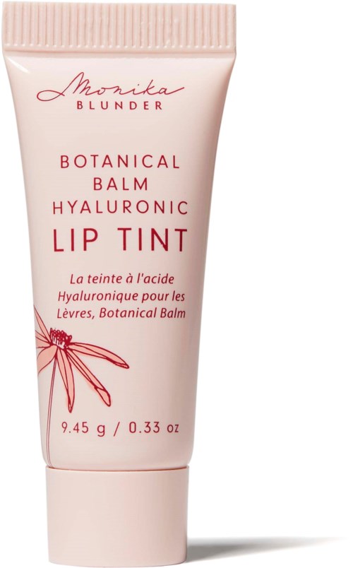 A pink tube labeled Monika Blunder Botanical Balm Hyaluronic Lip Tint with a red flower illustration.