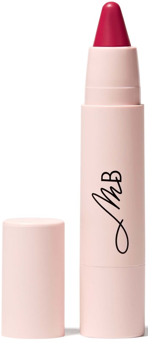 A pink lipstick with a cap placed beside it, showing the lipstick extended out of the tube.