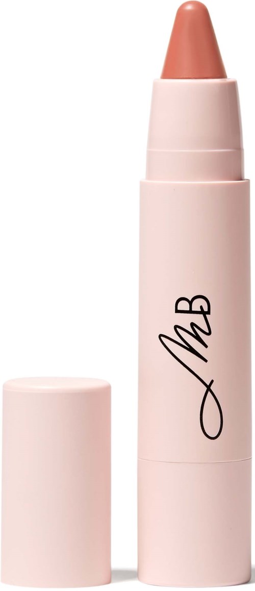 A beige cosmetic stick with a cap, labeled with a signature-style signature.