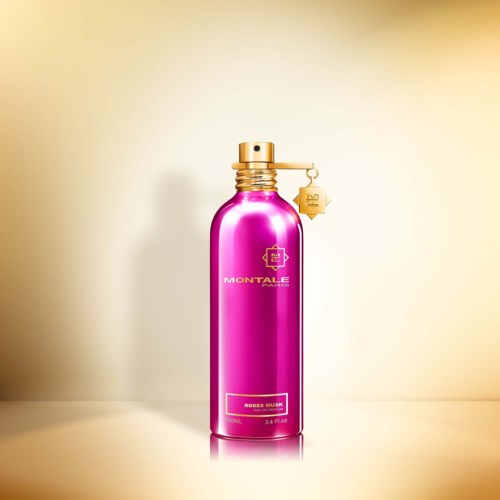 Eine glänzende pinke Flasche mit goldener Kappe und Ring, beschriftet 'Montale Paris' und 'Rose Milion'.