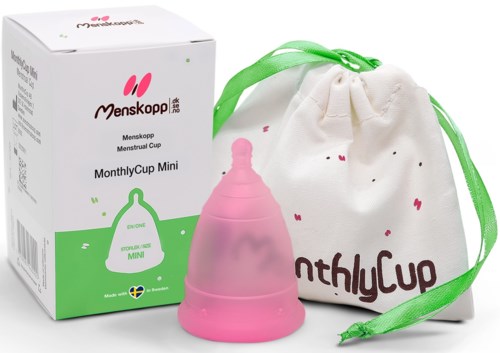 En menskoppssats med en rosa kopp, en vit väska och en låda med produktuppgifter.