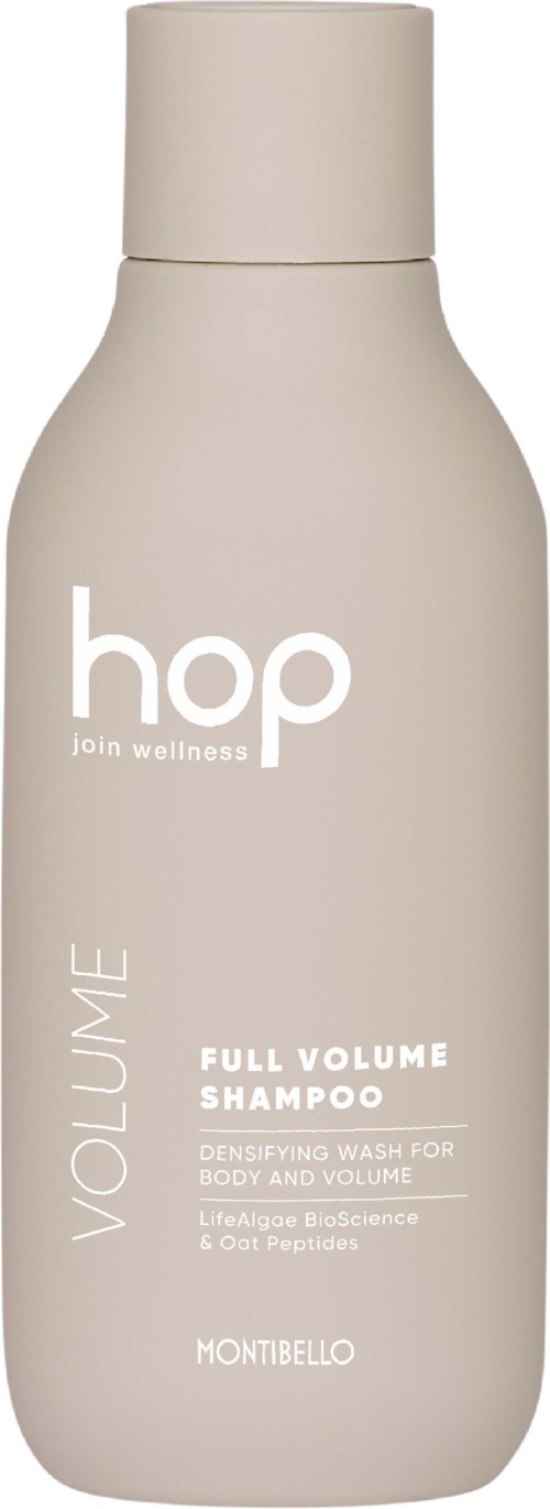 En beige flasche med Hop full volum sjampo med hvit tekst og enkel design.