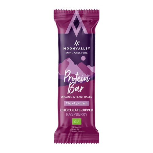 A purple and pink protein bar wrapper with mountain design, called Moonvalley, raspberry flavor, titled 'Protein Bar'.