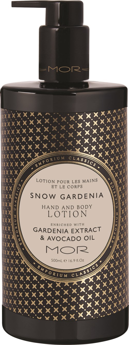 Svart flaske med gullmønster og pumpe, merket Snow Gardenia hånd- og kroppslotion, 550 ml.