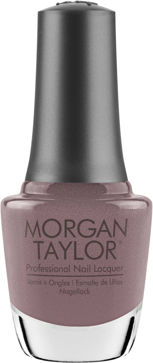 En flaska nagellack från Morgan Taylor i en mjuk mauve-färg med silverlock.