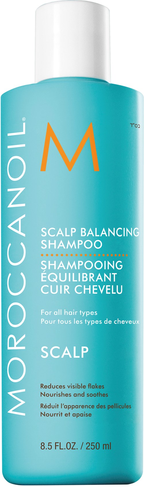 Flaskan är blå med vit text som visar att den är Moroccanoil scalp balancing shampoo för alla hårtyper.