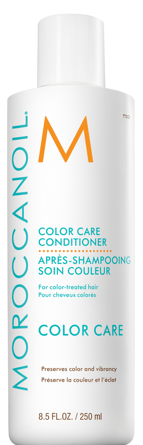 En vit flaska med blå och orange text märkt Moroccanoil, innehållande färgvårdskonditionerare för färgat hår.