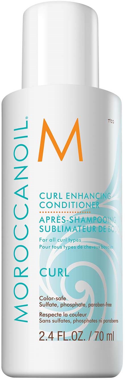 A white bottle labeled "Moroccanoil" with blue and orange text, containing curl enhancing conditioner for hair.