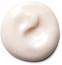 A white, creamy substance with a smooth, shiny surface, possibly lotion or cream.