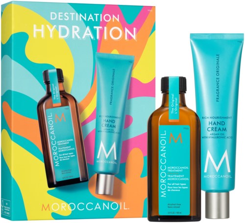 A skincare set with two brown bottles and two turquoise tubes, featuring bright, colorful packaging background.