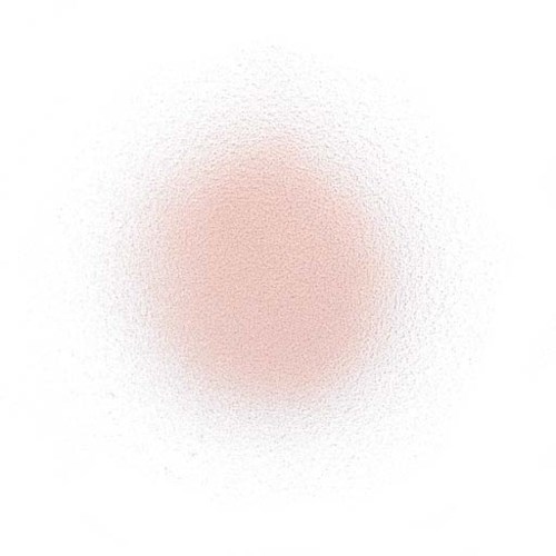 A soft pink circle with a fuzzy edge on a white background.