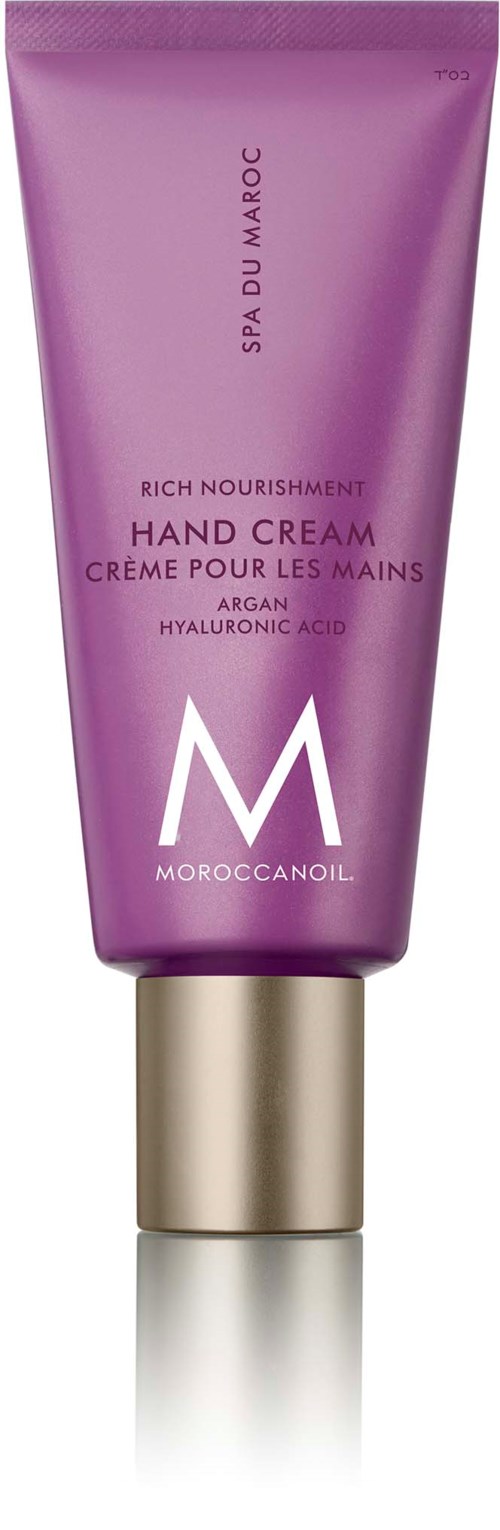 A purple tube contains MoroccanArgan hand cream, labeled for nourishing and containing hyaluronic acid, with a gold cap.