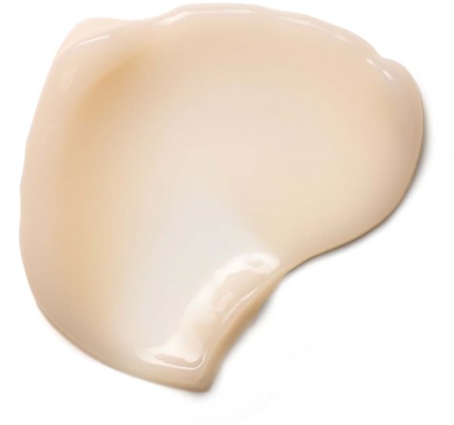 En ljus beige kräm eller lotion med slät, mjuk konsistens och glänsande yta.