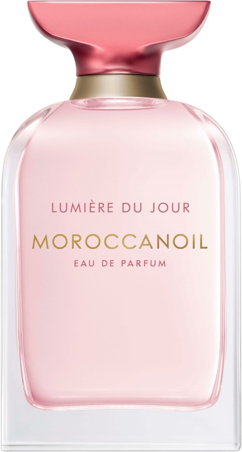 Różowa butelka perfum z złotym i różowym korkiem. Tekst mówi, że to Morocco Oil Eau de Parfum.