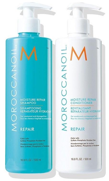To flasker med Moroccanoil hårpleieprodukter, én blå og én hvit, merket for fuktgjenoppretting og balsam.