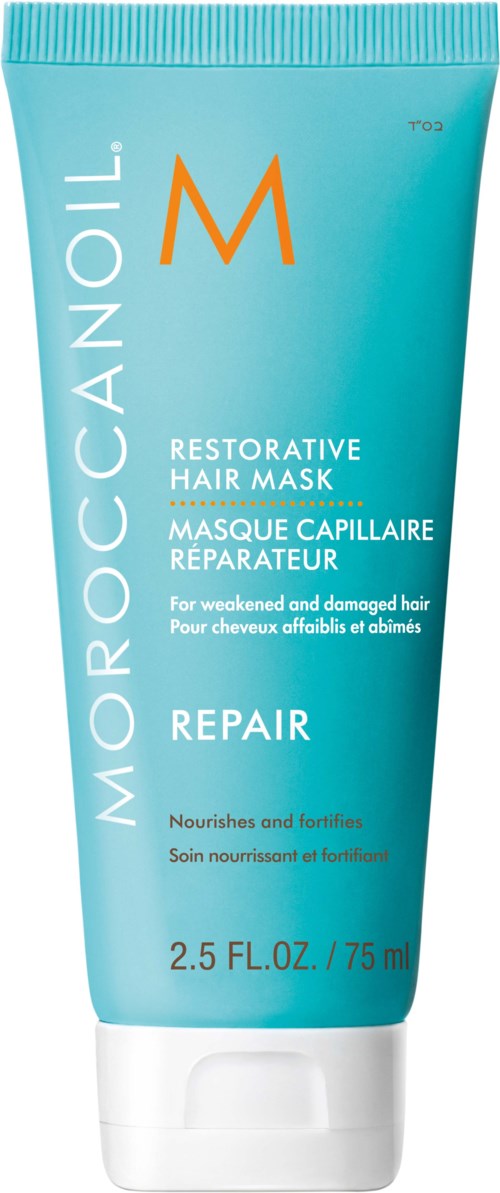 En blå tub med Moroccanoil Restorative Hair Mask med vit och orange text, och vit lock.
