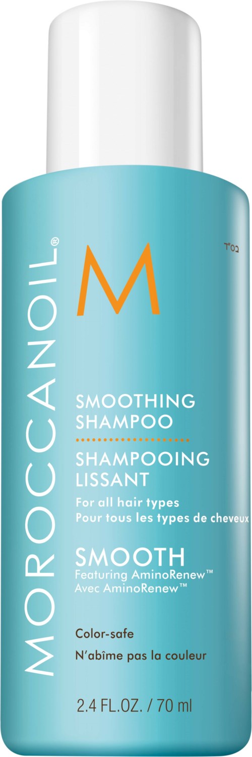 En turkis flaske med Moroccanoil glatt sjampo med hvit hette, merket for alle hårtyper.
