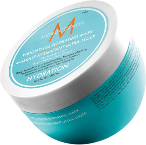 En blå och vit behållare för fuktgivande hårmask märkta 'Moroccanoil' och 'Weightless Hydrating Mask'.