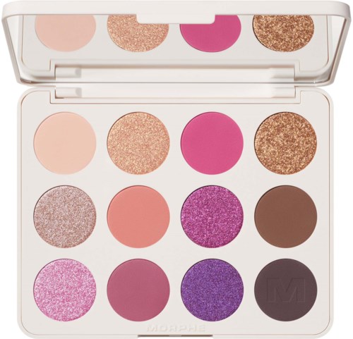 A eyeshadow palette with twelve colorful and glittery shades arranged in three rows.