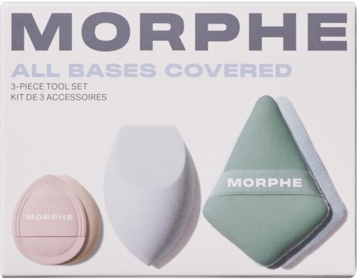 A set of three makeup sponges in pink, white, and green with the Morphe brand label.