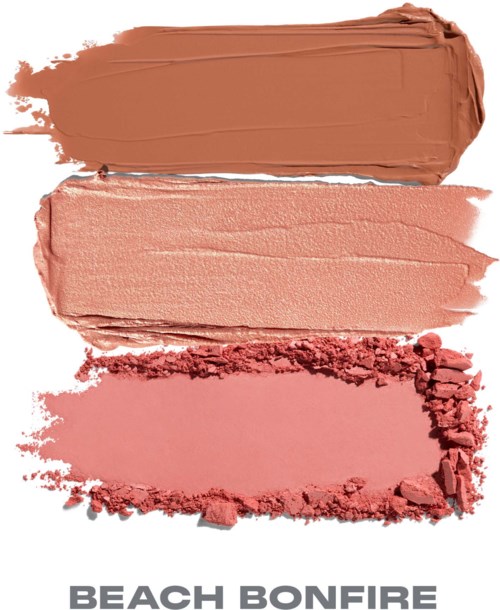 Tre lager av makeupprodukter: en brun kräm, en persikofärgad kräm och rosa puder. Märke: Beach Bonfire.