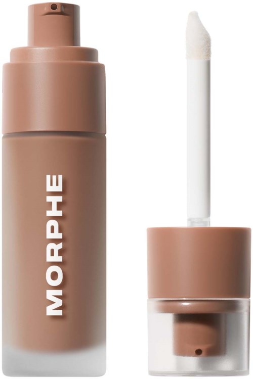 A beige liquid foundation bottle with an attached applicator that has a white sponge tip.