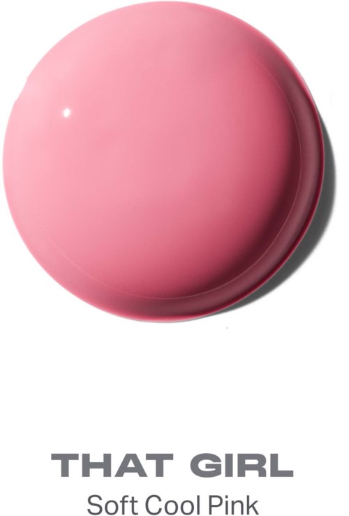 En myk rosa rund gjenstand med glatt overflate og skygge. Teksten sier "THAT GIRL" og "Soft Cool Pink."