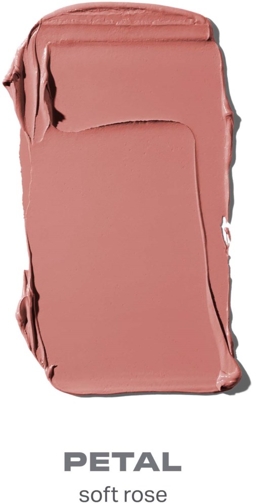 En rektangulär bit av mjuk rosfärgad makeup med ojämna kanter och slät yta.
