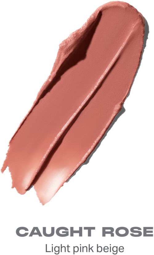 En lys rosa beige sminkprøve med merket CAUGHT ROSE.