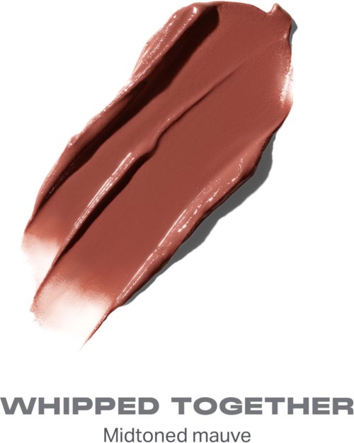 En stripe av mauve leppestift med teksten Whipped Together i grå bokstaver.