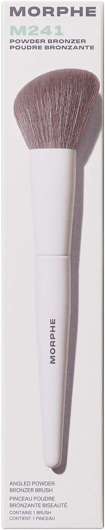 A Morphe powder bronzer brush in white with soft pink bristles, shown in packaging.