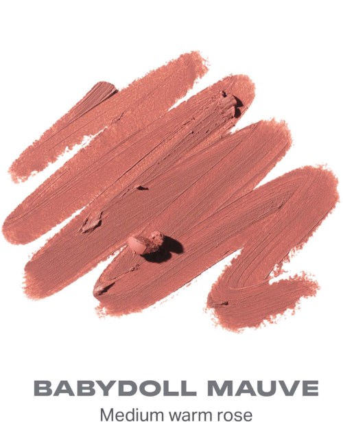 Prøver af medium varm rosa læbestift eller gloss i en cremet tekstur.
